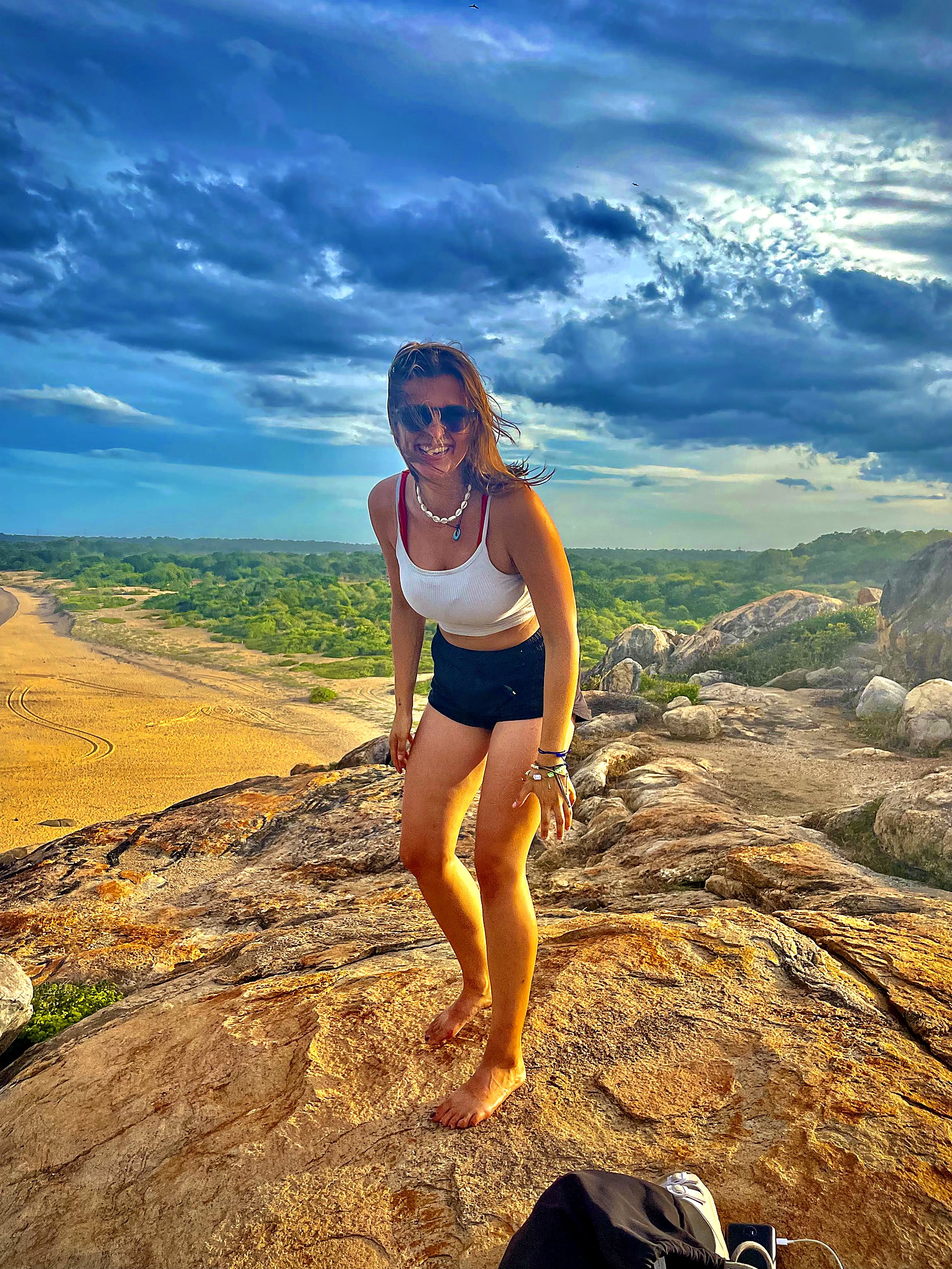 Guest at a coastal rock viewpoint