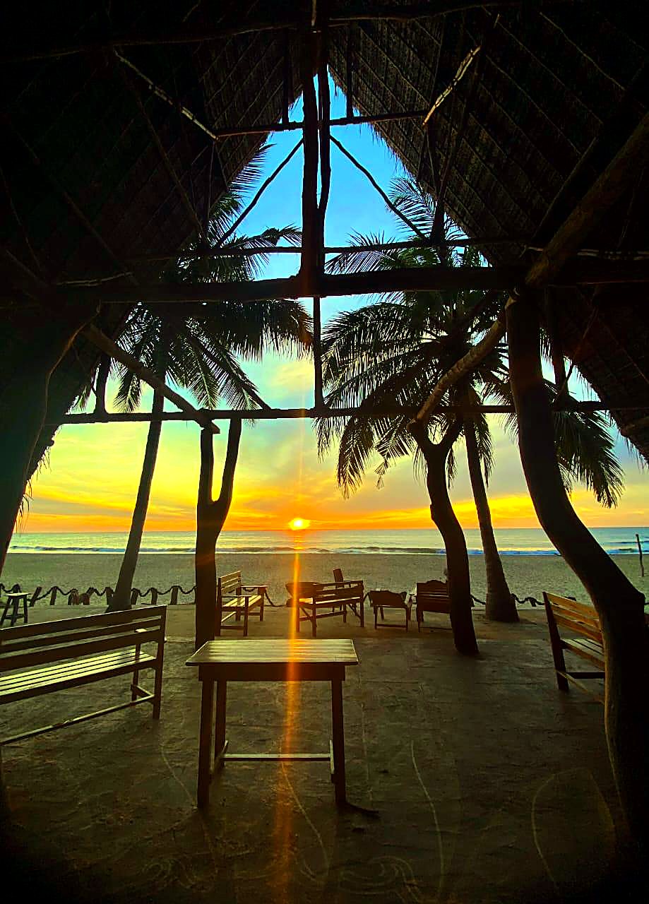 Sunset through the natural-wood restaurant